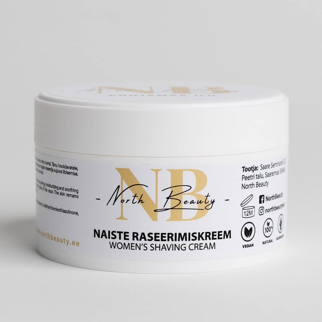 a bold close-up of rich women's shaving cream with vitamin e and almond oil