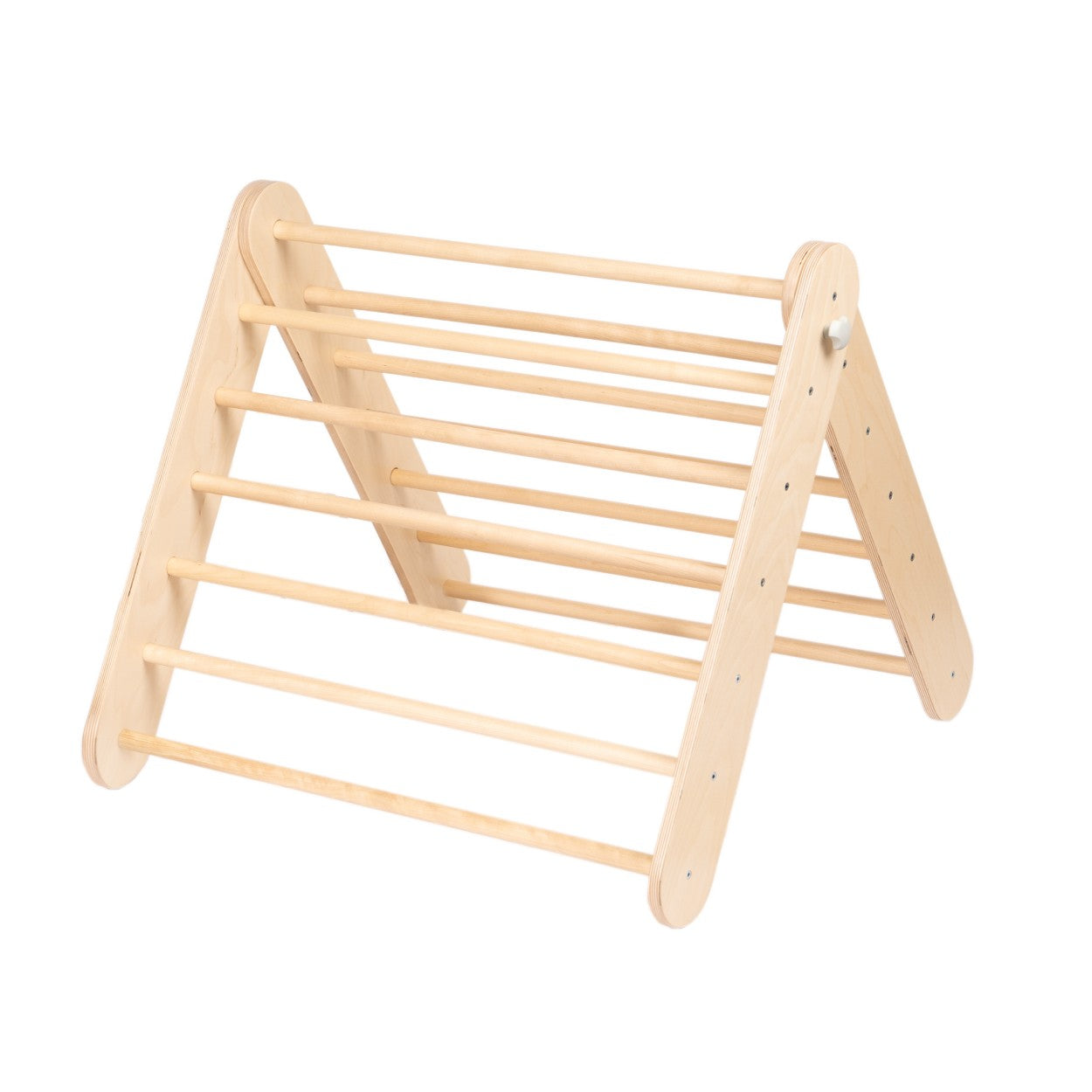 a child's hand elegantly grasping the smooth birch rung of a minimalist pikler triangle