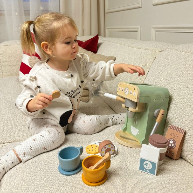 functional woopie green wooden coffee maker playset with all 25 pieces laid out for a practical play session