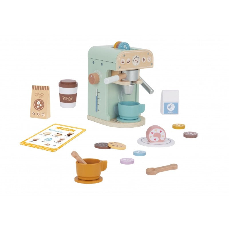 a child's hands arranging the wooden pastries from the woopie green coffee playset