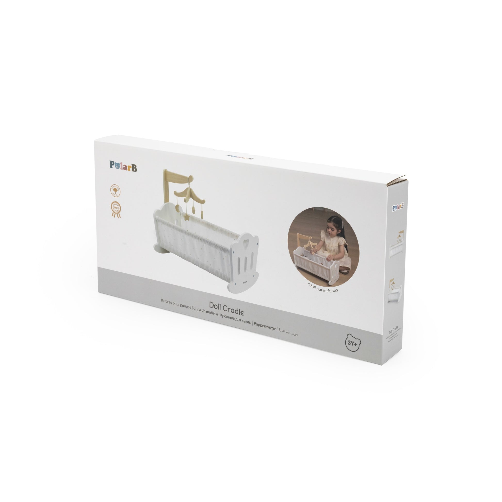 soft pastel wooden doll cradle with starry cotton bedding, gentle mobile, and smooth rubber wheels