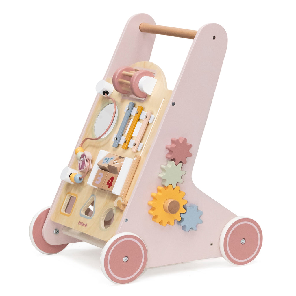 elegant pink wooden walker with pastel details, showcasing the shape sorter and fabric basket in soft lighting