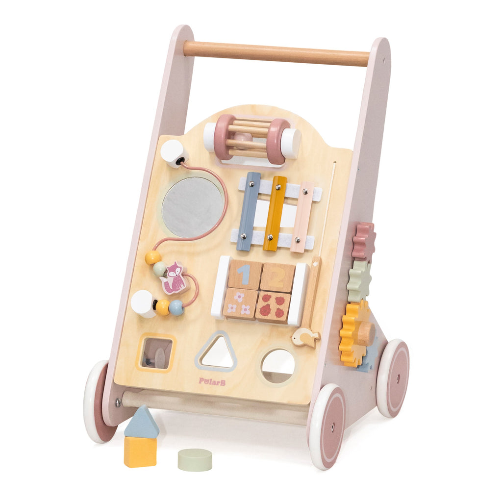 bold pink wooden walker with spinning wheels and shape sorter for toddlers learning to walk