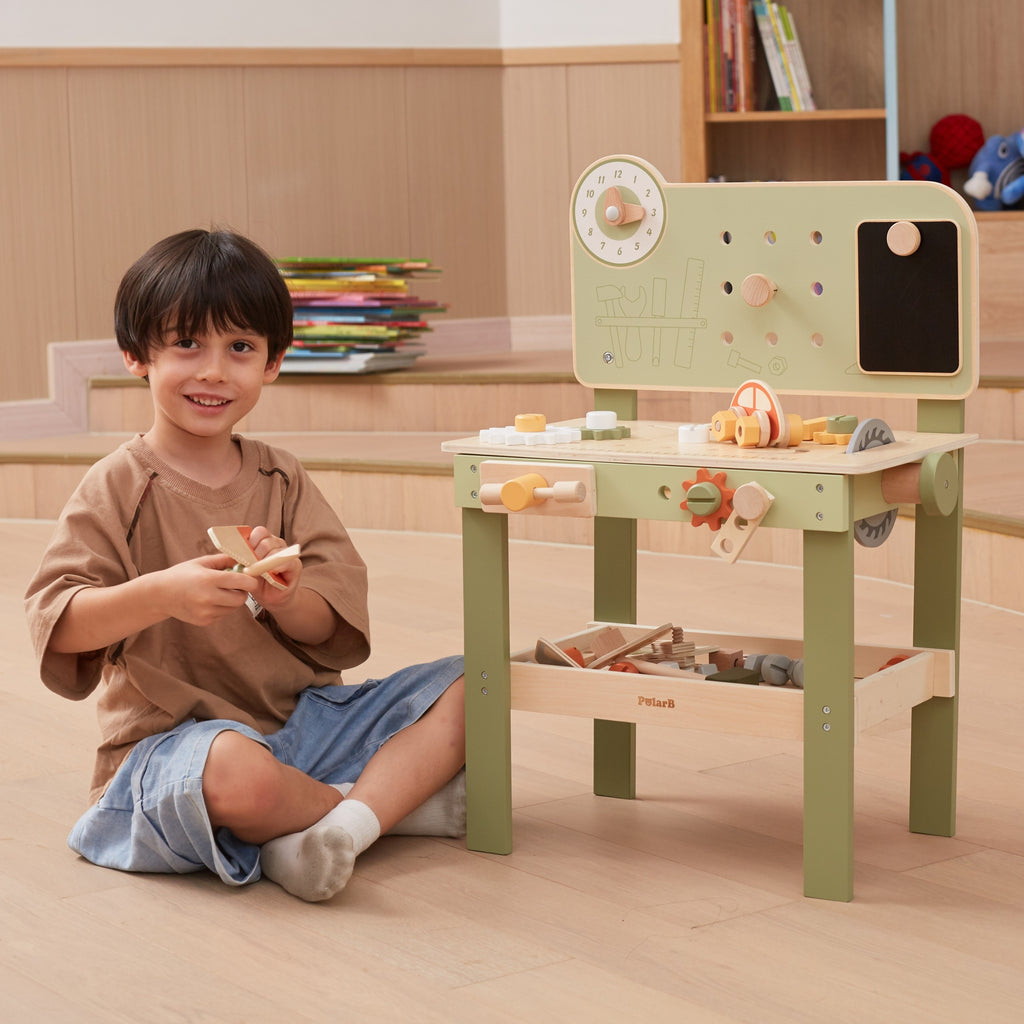 bold wooden handyman's workshop for kids with tools, gears, and toy cars on a sturdy workbench