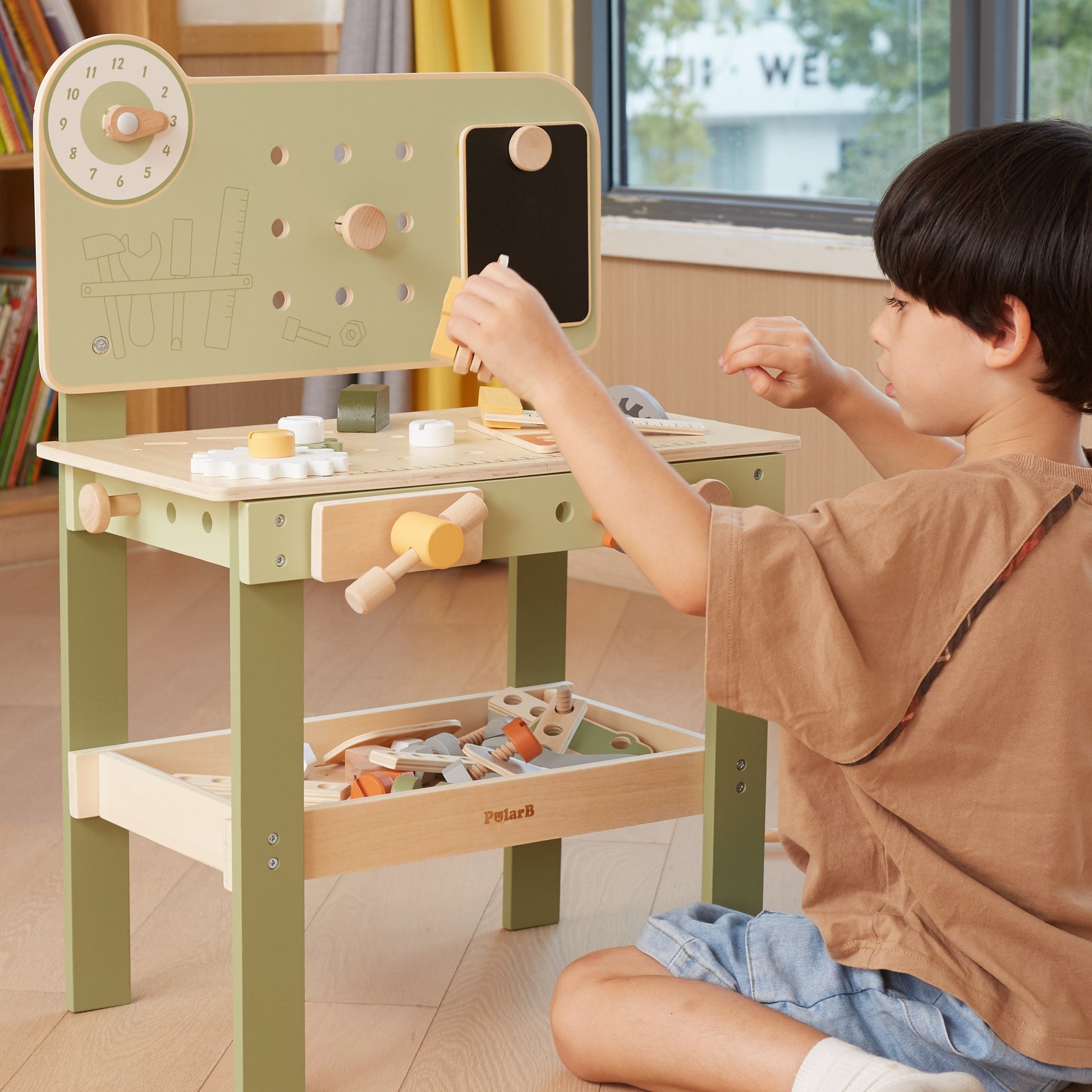 smiling child fixing a toy car on the wooden workshop with colorful gears and tools scattered playfully
