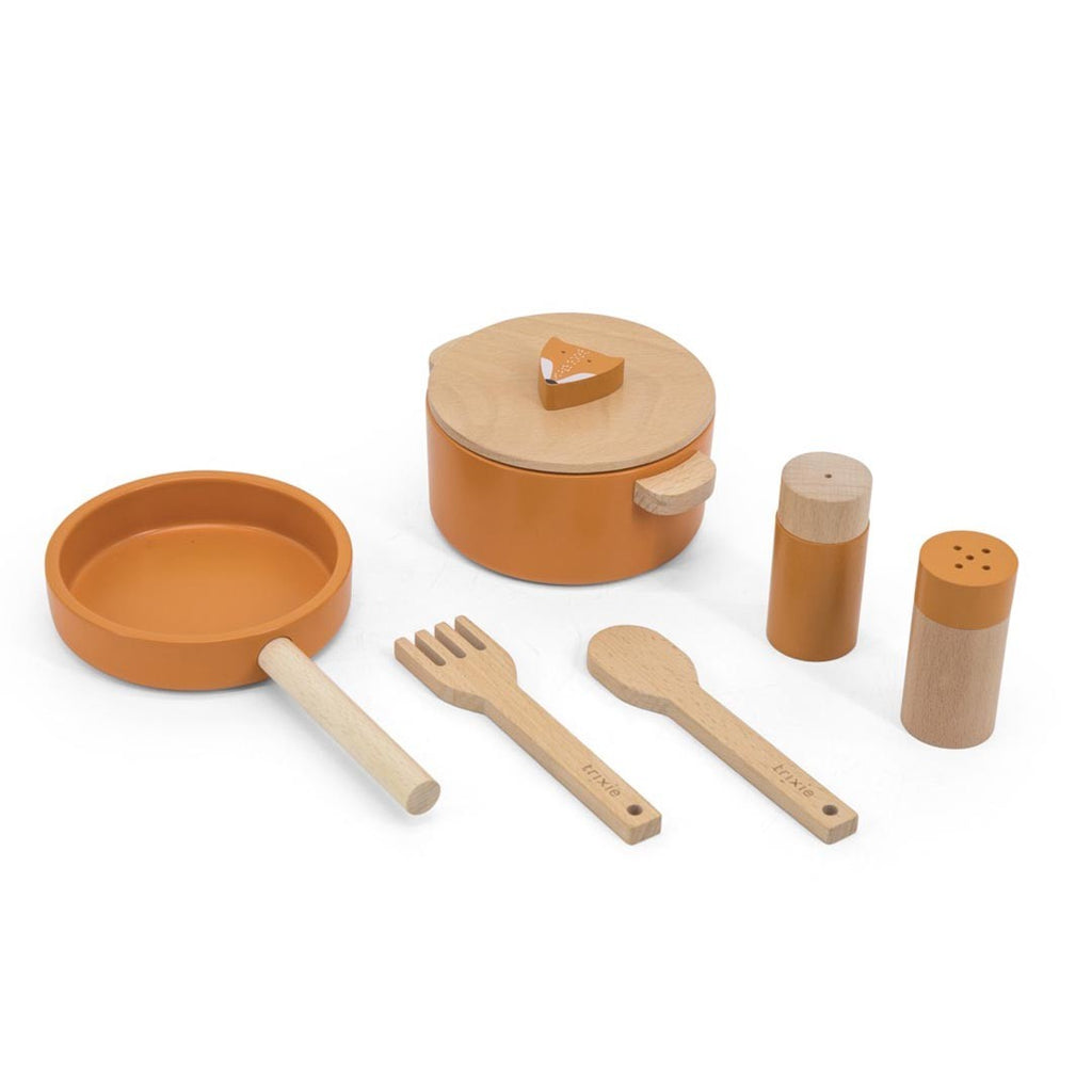 Let's start cooking! With this fun set featuring one of our animal friends, your child will have hours of fun preparing the craziest soups and dinners. The set comprises one pot, one pan, a salt and pepper set, spoon and fork. Simply add the secret ingredient of imagination and you're good to go! The cooking set is made of 100% FSC® certified wood. All paints on this product are water-based, safe for children and non-toxic. by Trixie Baby at www.brixbailey.com