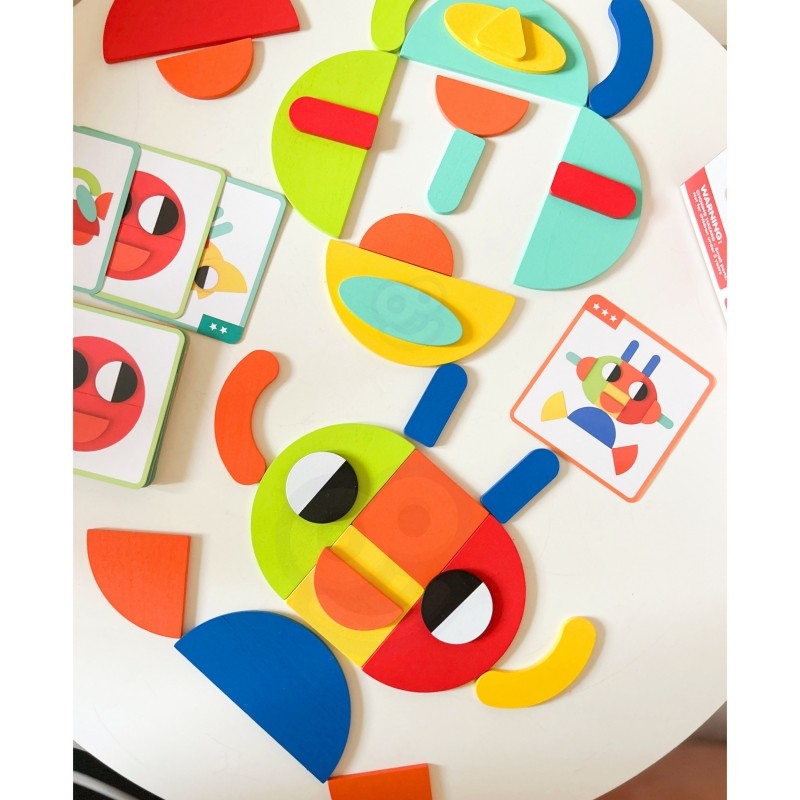 child's hand placing a wooden butterfly shape on a vibrant montessori puzzle board