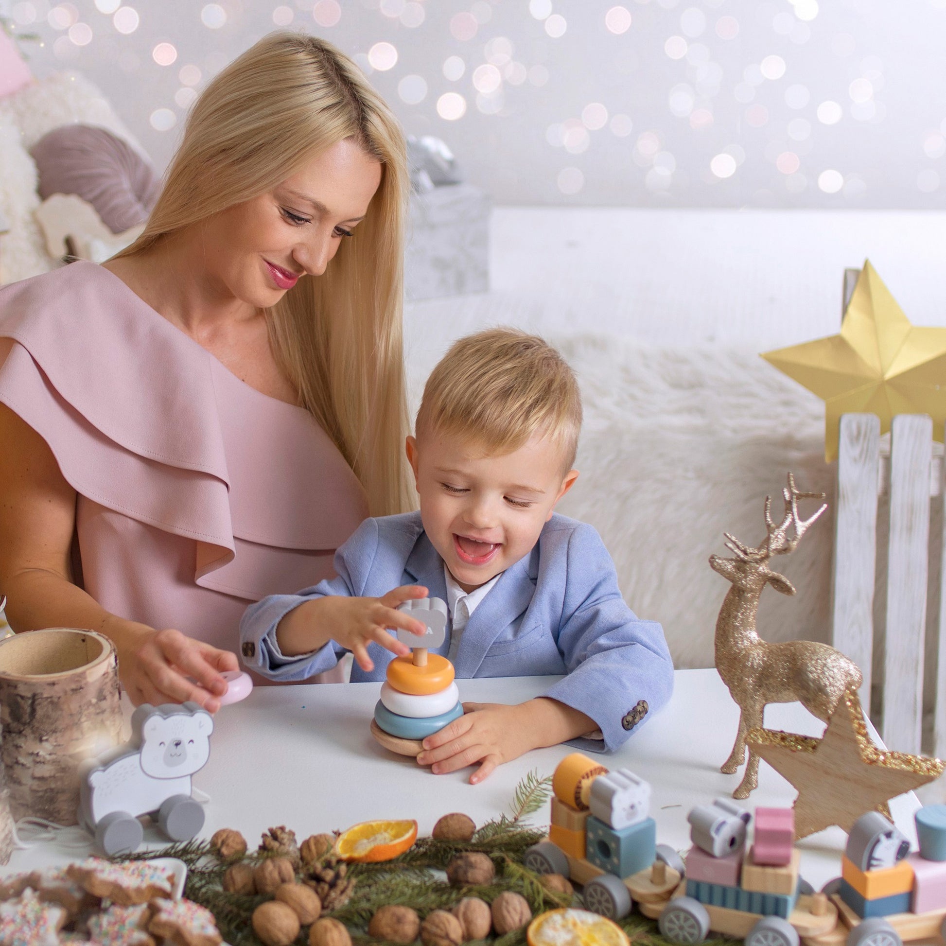 wooden polar bear stacking pyramid and pounding bench set with pastel colors for toddler motor skills