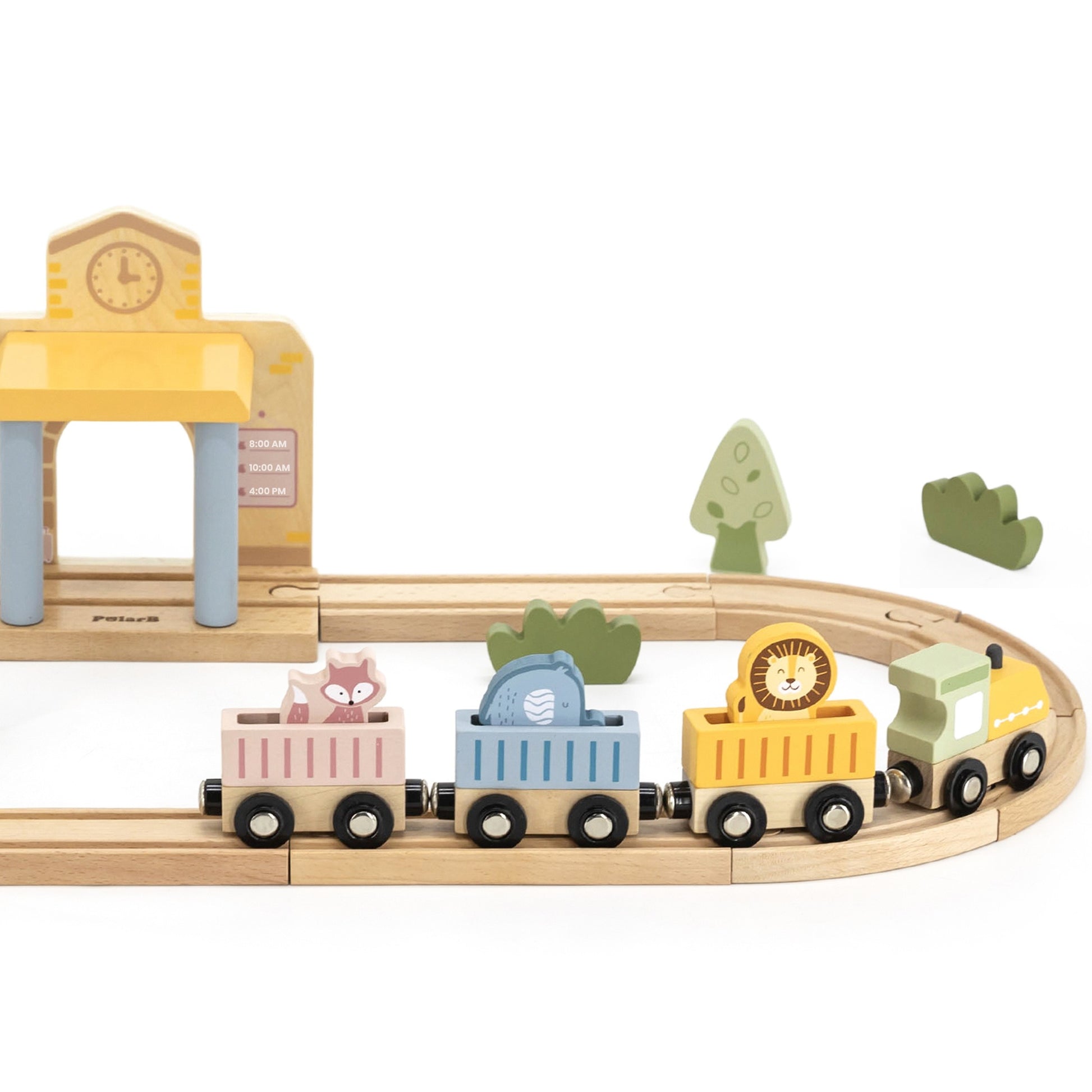 wooden train set with xylophone and threading toys for toddlers, pastel colors on a sunny playroom table