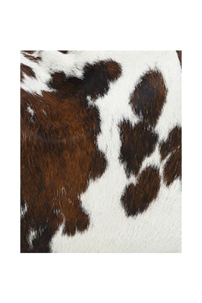 Luxurious Spotted Cow Calf Hair Tassel Bag – Elegant & Versatile by Sostter at brixbailey.com