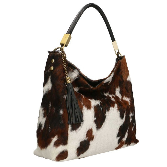 Spotted Cow Calf Hair Leather Bag – Elegance & Versatility by Sostter at brixbailey.com