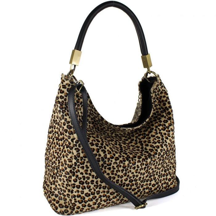 Cheetah Print Leather Tassel Grab Bag – Elegant & Versatile by Sostter at brixbailey.com