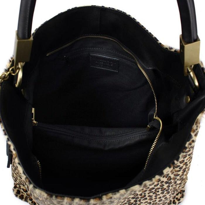 Cheetah Print Leather Tassel Grab Bag – Elegant & Versatile by Sostter at brixbailey.com