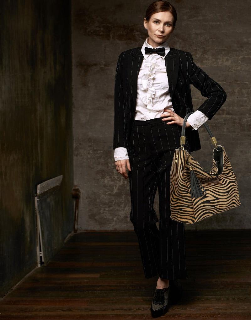 Gold Zebra Print Leather Tassel Bag – Elegant & Versatile by Sostter at brixbailey.com