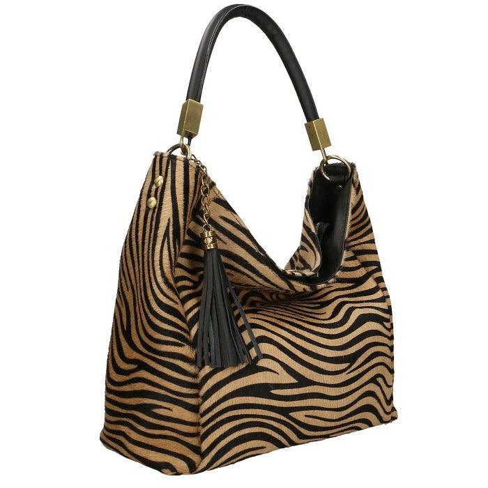 Gold Zebra Print Leather Tassel Grab Bag – Chic & Versatile by Sostter at brixbailey.com